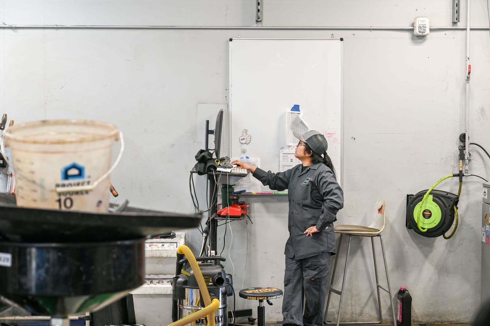 A technician at the bench at Earthling Automotive