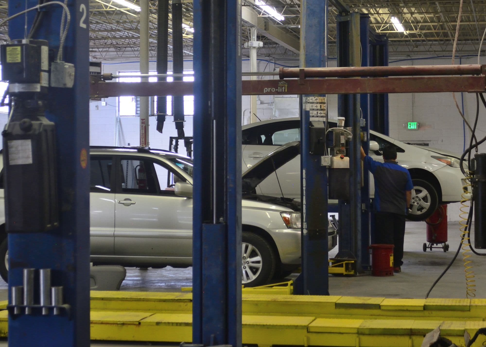 Cars on the lifts at Mile Hybrid