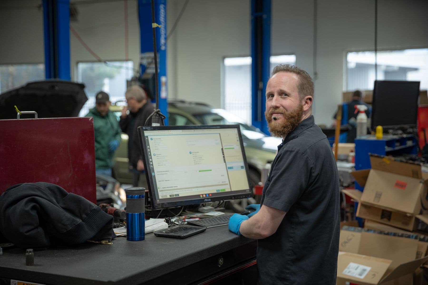 Diagnosis at a shop workstation at Atomic Auto