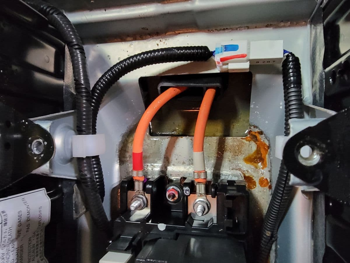 A Highlander Hybrid battery pack out of the car at Atomic Auto