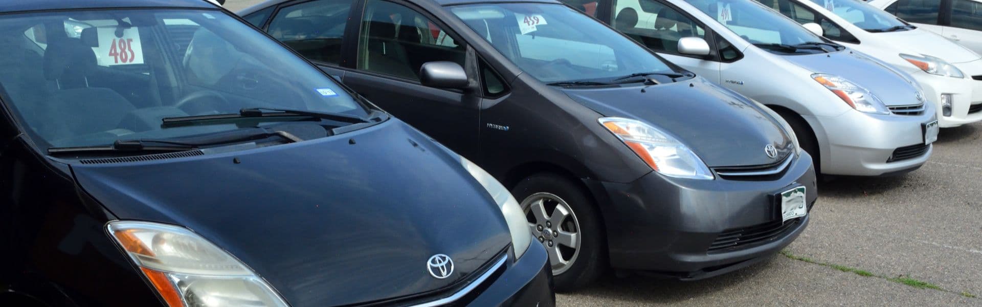 Priuses parked outside Mile Hybrid in Denver
